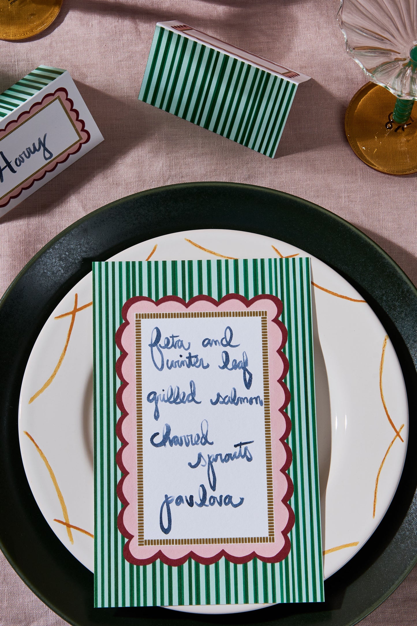 Flatlay candy stripe menu dinner party