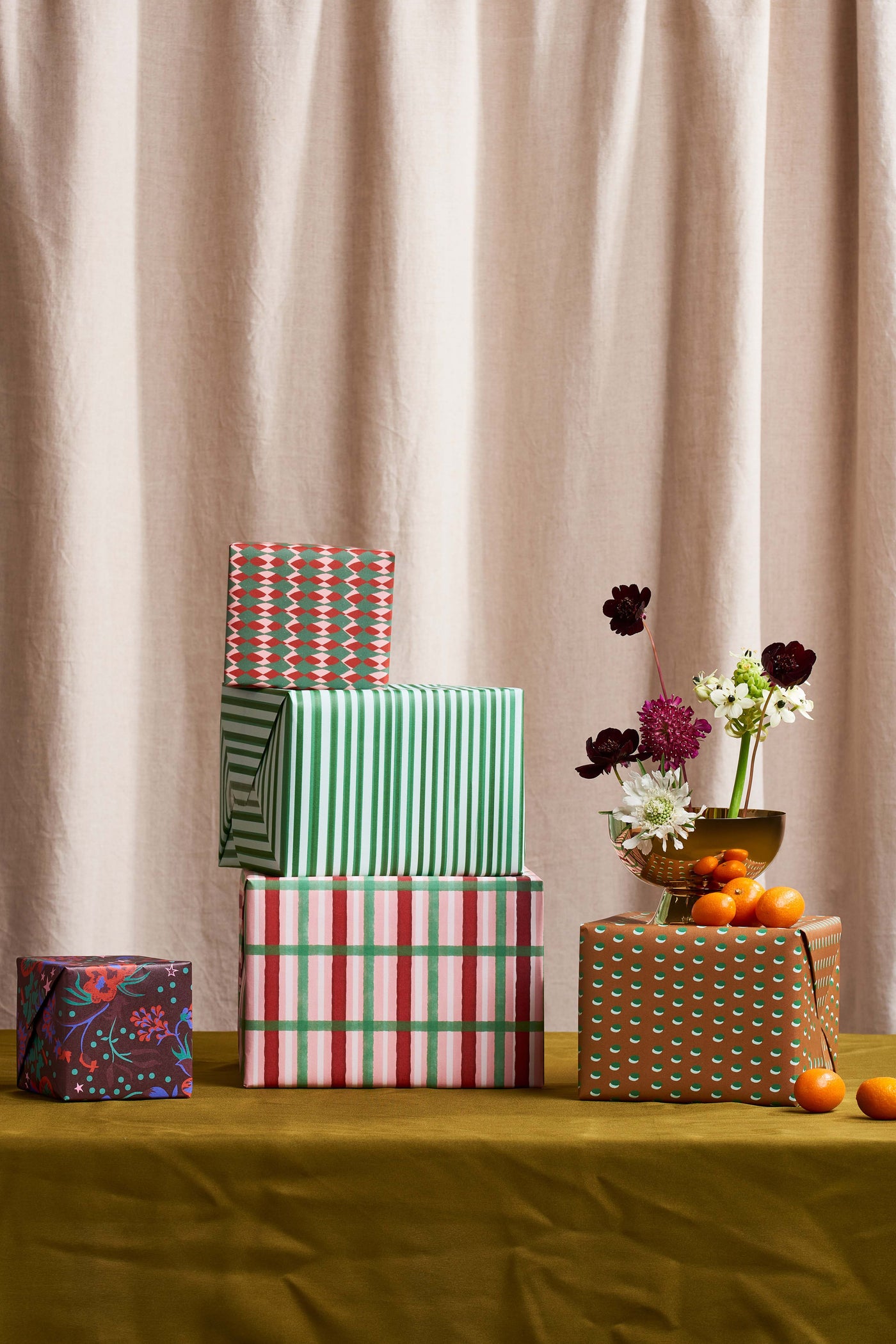 Small box wrapped in red and green diamond gift wrap